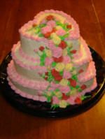 Layered heart cakes with falling flowers