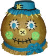 Scarecrow decorated, sculptured cake with large marshmallow hat